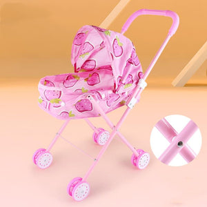 Pink doll stroller with strawberry pattern on a peach background