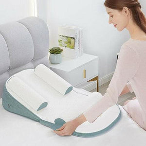 a mom is setting up a baby lounger