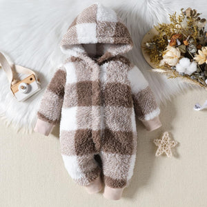 A baby hooded plaid fluffy fleece long-sleeve romper in brown and white checkered pattern, displayed against a white background with decorative elements around.
