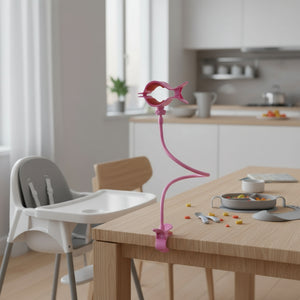 Pink hair styling tool with a flexible arm on a white background