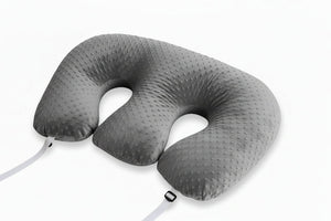 U-shaped twin nursing pillow with textured surface on a white background