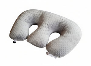 U-shaped twin nursing pillow with textured surface on a white background