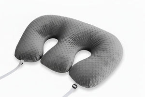 U-shaped twin nursing pillow with textured surface on a white background
