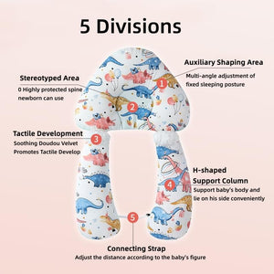 Baby support pillow with dinosaur pattern and labeled features on a pink background