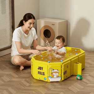 Woman and child playing in a yellow inflatable pool with water and toys.