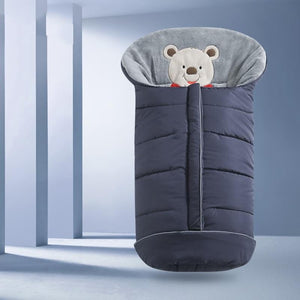 Children's sleeping bag with bear design on a light blue background