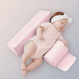 Baby sleeping on a pink pillow with cherry blossom pink color swatch and A-Muse logo.