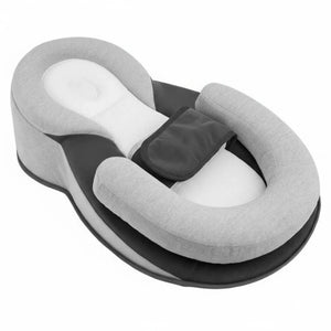 Gray and white baby lounger pillow with a visible brand logo on a white background