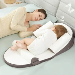 mom and baby taking a nap on a baby lounger safe
