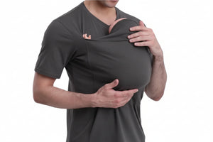 Person wearing a gray shirt with a unique design on a white background