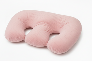 Pink U-shaped pillow on a white background