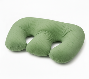Green travel neck pillow on a white background