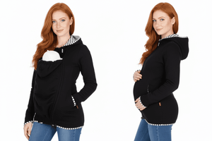 Black hoodie with zebra-striped hood worn by a person on a white background
