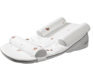 A white baby travel pillow set with quilted cushioning, breathable mesh side panels, and small teddy bear face prints, displayed on a clean white background.