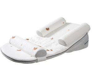 A white baby travel pillow set with quilted cushioning, breathable mesh side panels, and small teddy bear face prints, displayed on a clean white background.