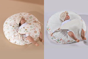 A newborn lounger pillow with a printed design, featuring a baby lying on it in a supine position.