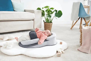 baby in a baby lounger pillow