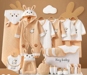 Baby clothing set with cartoon designs on a brown background