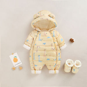 Baby snowsuit with cartoon design and matching booties on a light gray background