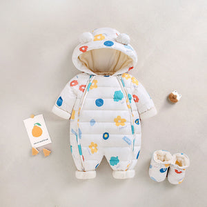 Baby snowsuit with colorful floral patterns and matching booties on a neutral background