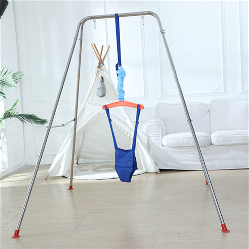 Children's swing set with blue seat and orange handles on a metal frame in a room.