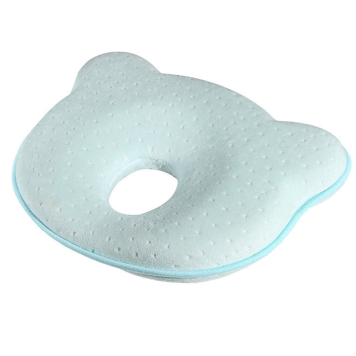 Light blue baby head support pillow on a white background