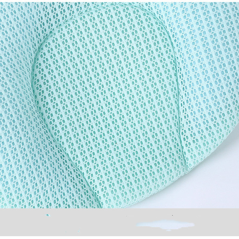 Teal patterned fabric on a white background