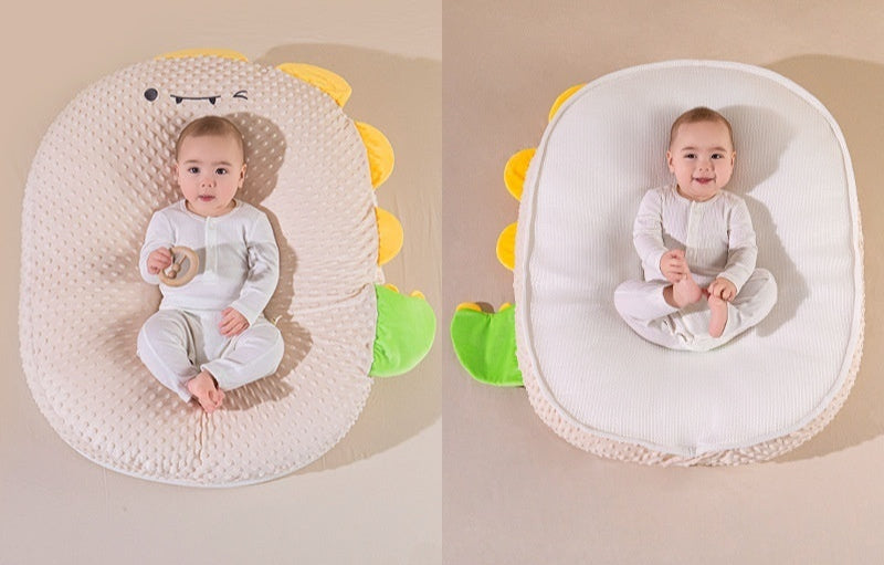 Two views of a baby seat with dinosaur design on a beige background