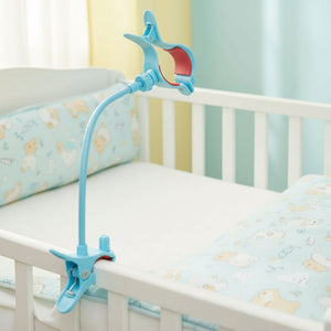 Blue and red clamp with a long flexible arm on a white background