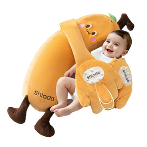 Baby sitting in a plush, carrot-shaped cushion with 'Shiada' branding on a white background.