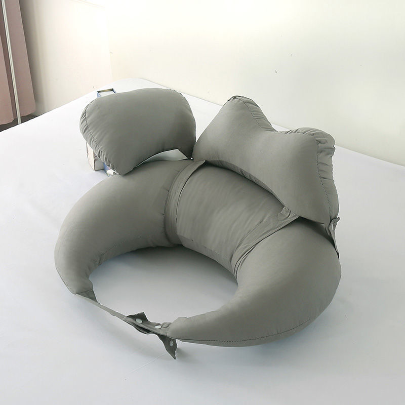 Gray inflatable neck pillow on a white surface