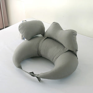 Gray inflatable neck pillow on a white surface