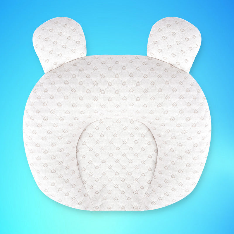 Baby cushion with bear ears on a blue background
