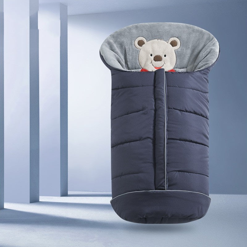 Children's sleeping bag with bear design on a light blue background