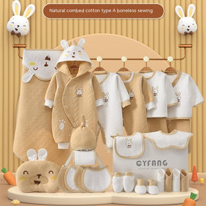 Baby clothing set with cartoon designs on a wooden display