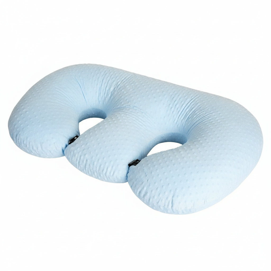 White U-shaped travel pillow on a white background