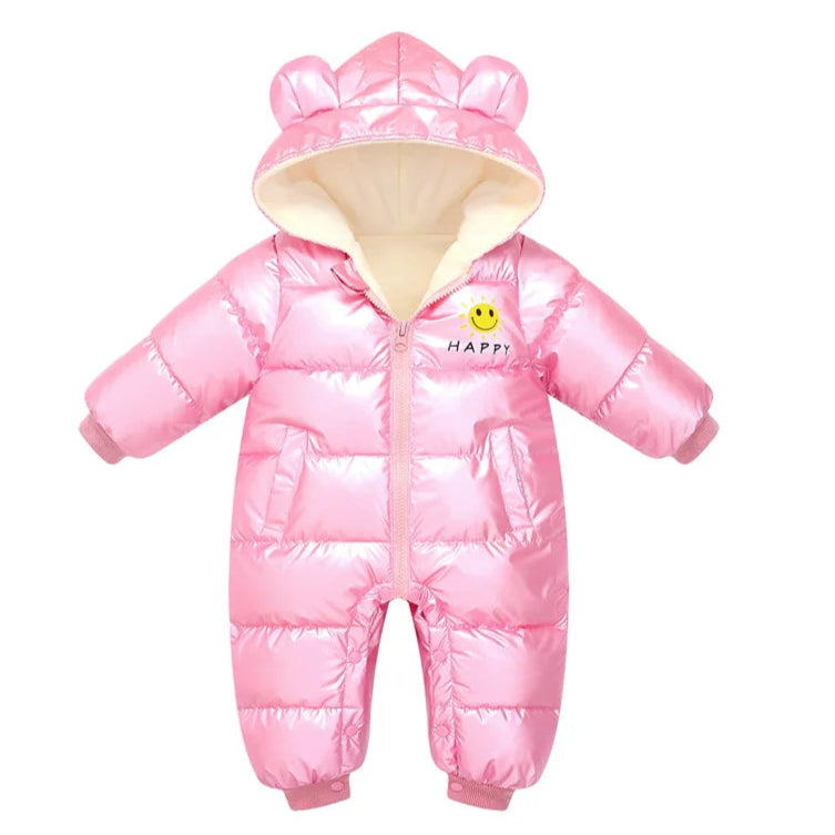 Pink baby snowsuit with hood and smiley face design on a white background