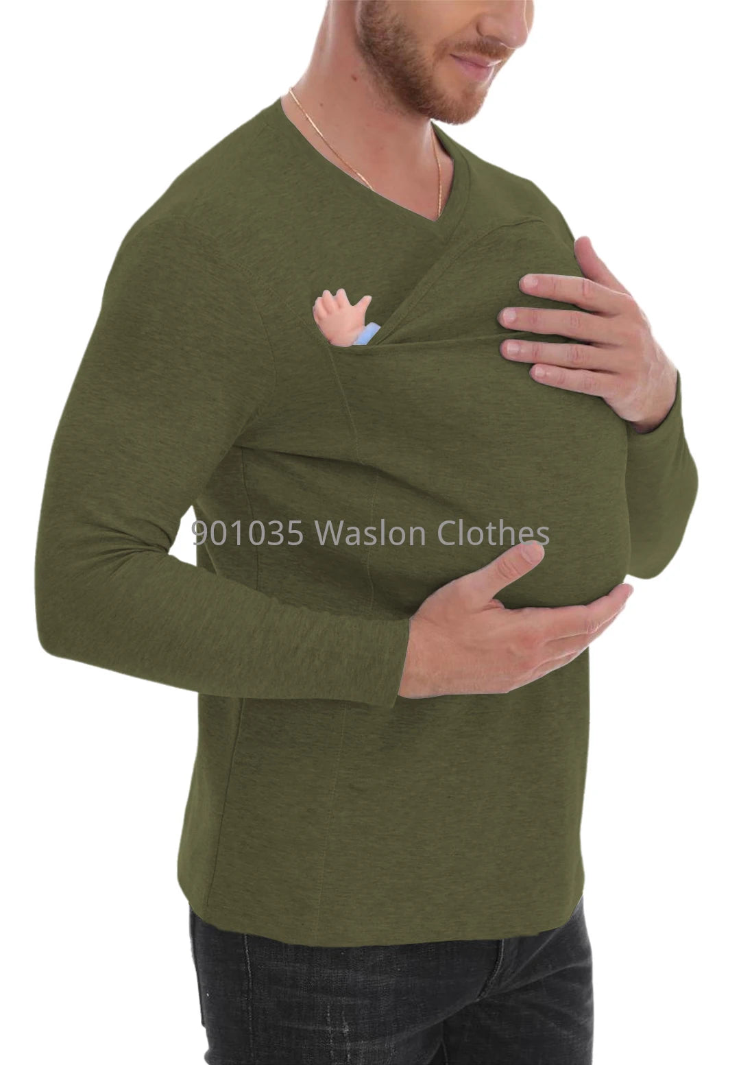 A man wearing a black long-sleeved baby carrier shirt with a baby in it, designed for hands-free bonding.