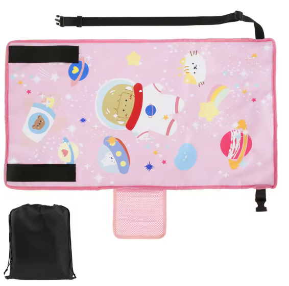 Pink mat with cartoon designs and black straps, accompanied by a black drawstring bag.