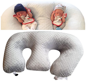 Baby U-shaped pillow with two babies on a white background