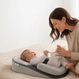 Woman with a baby using a wedge pillow on a bed, with text about its benefits.