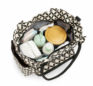 Patterned tote bag with baby bottles and items on a white background