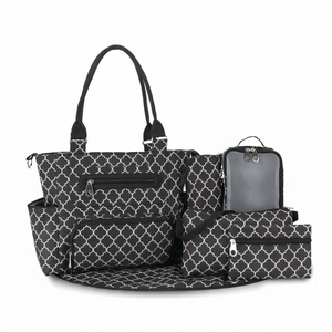 Black geometric patterned diaper bag with multiple pockets on a white background