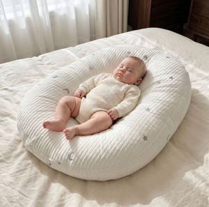 Baby lying on a textured circular pillow in a bedroom setting