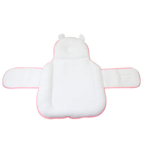 White baby bathtub support with pink trim on a white background