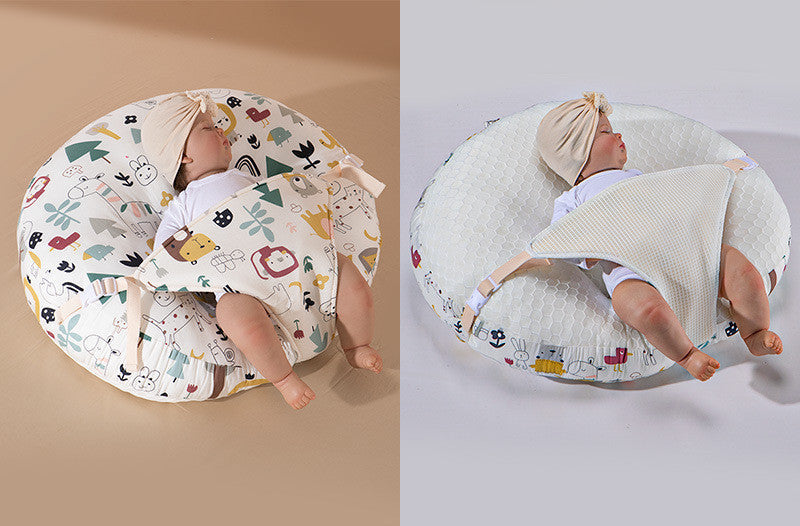 A newborn lounger pillow with a printed design, featuring a baby lying on it in a supine position.