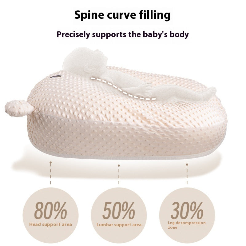 Baby pillow with text highlighting spine curve filling and body support, on a white background.