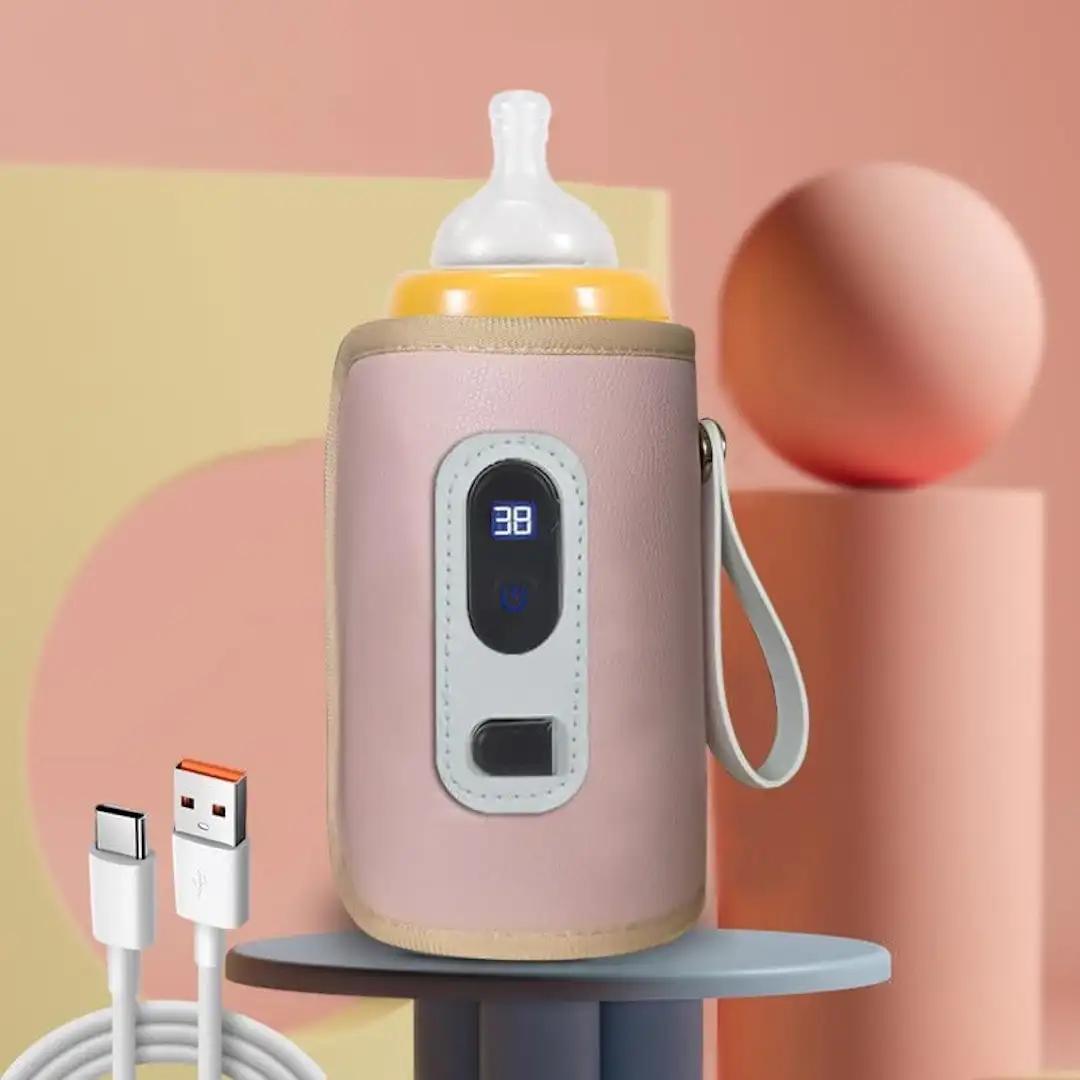 Pink baby bottle warmer with digital display on a colorful background